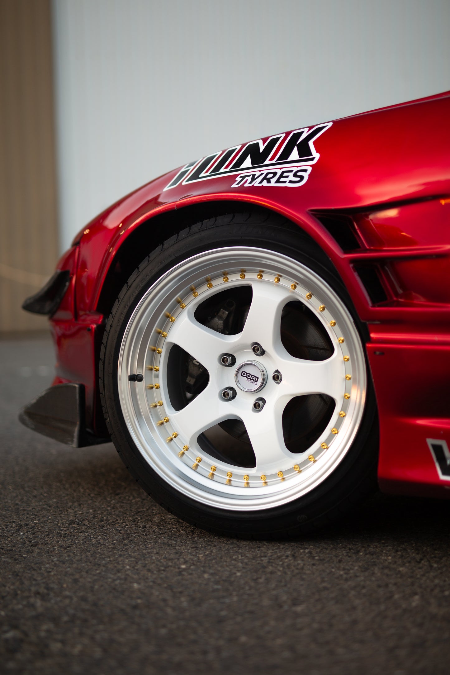 DORI ICHI on Nissan Sonvia (White with machined lip)