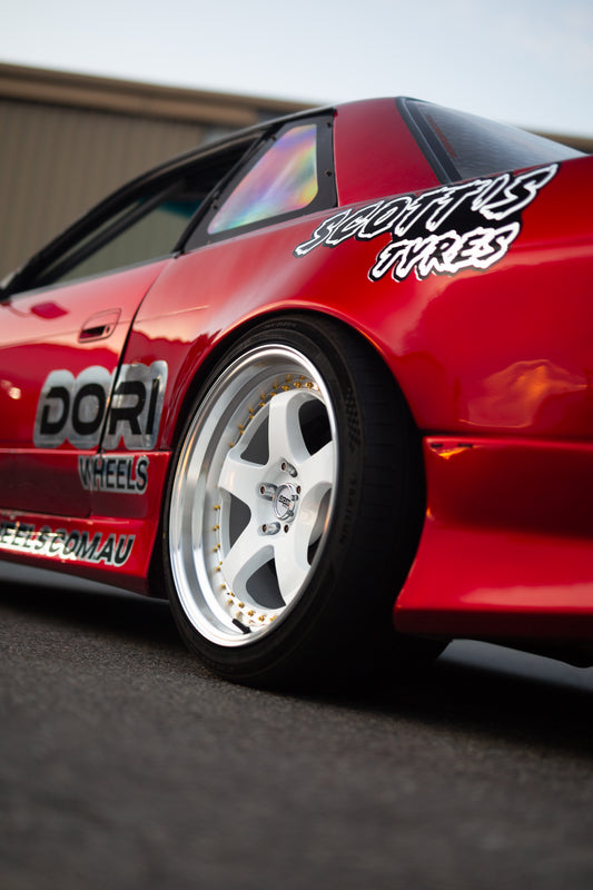 DORI ICHI on Nissan Sonvia (White with machined lip)